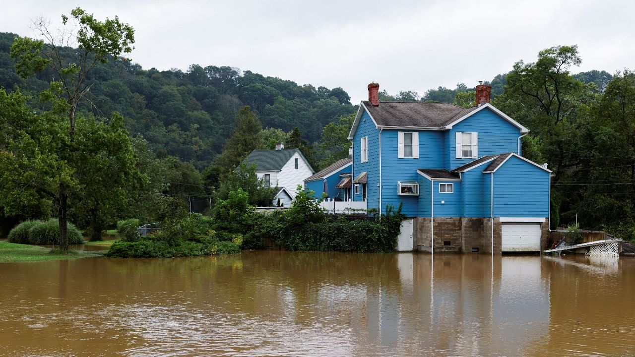 A house sits safely above flood waters as heavy rains from storm Ida causes flooding in Glenshaw, Pennsylvania. Credit: Reuters Photo