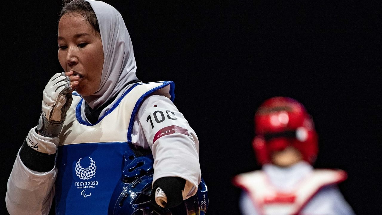 Afghanistan's Zakia Khudadadi reacts during the women's taekwondo K44 -49kg repechage. Credit: AFP Photo