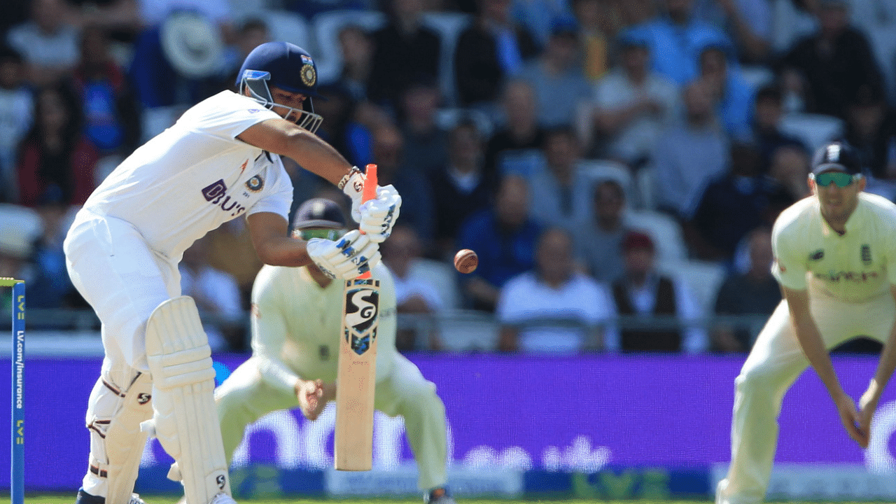 ndia's Rishabh Pant edges the ball to England's Craig Overton. Credit: AFP Photo