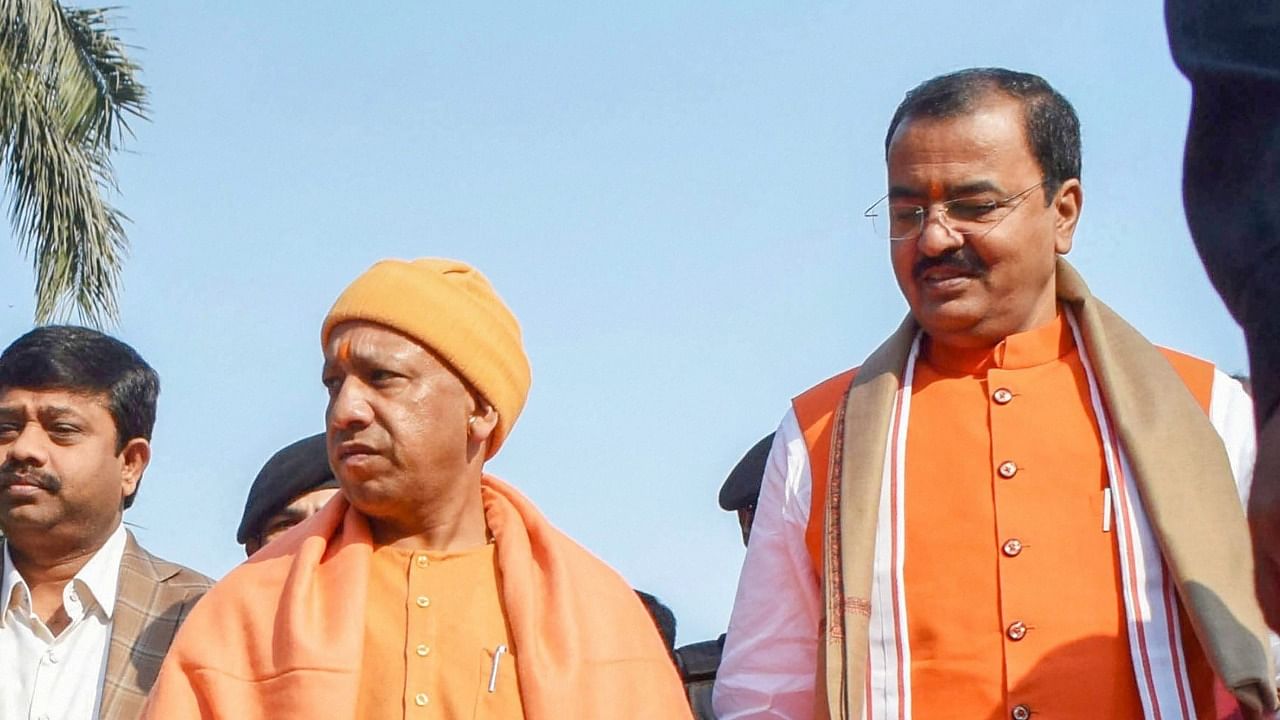 Yogi Adiyanath (L) and Keshav Prasad Maurya. Credit: PTI Photo