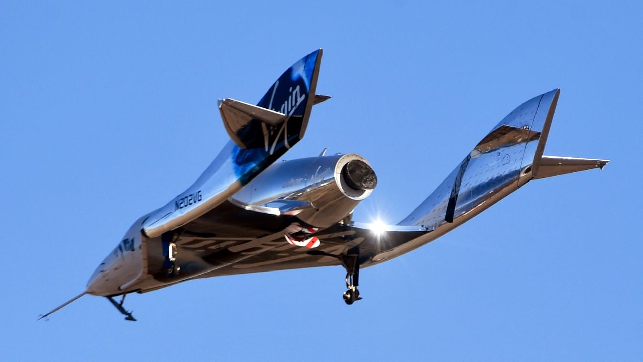 Virgin Galactic’s space tourism rocket plane SpaceShipTwo returns after a test flight from Mojave Air and Space Port in Mojave, California. Credit: Reuters Photo