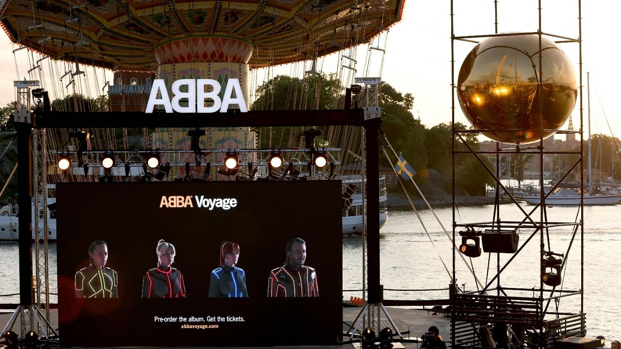 Members of the Swedish group ABBA are seen on a display during their Voyage event at Grona Lund, Stockholm, on September 2, 2021, during their presentation of the first new song after nearly four decades. Credit: AFP Photo