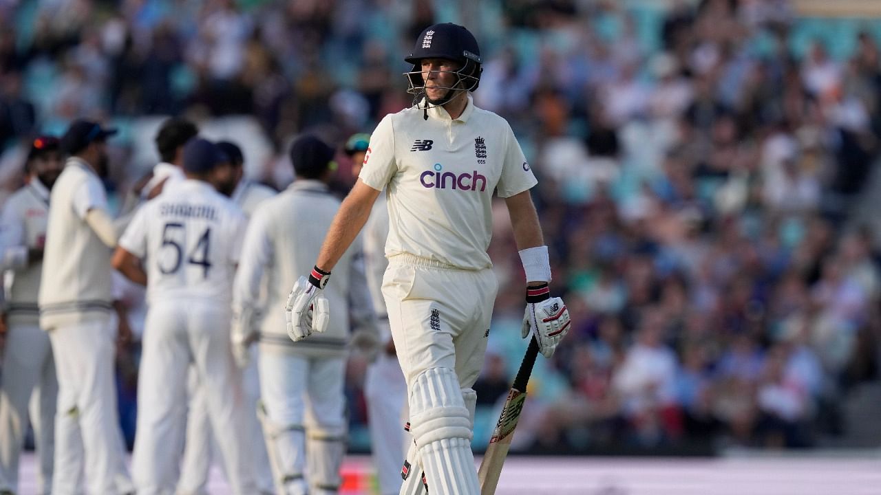 England's Joe Root walks from the pitch after being clean bowled by India's Umesh Yadav on the first day of the 4th cricket Test between England and India at The Oval cricket ground in London, Thursday, September 2, 2021. Credit: AP/PTI Photo