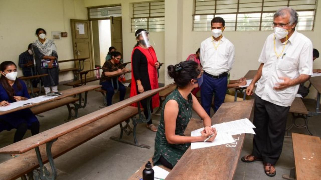 Tearable marks cards will be issued for third- and fourth-semester undergraduate exams taken by students of the 2018-19 batch. Credit: DH File Photo