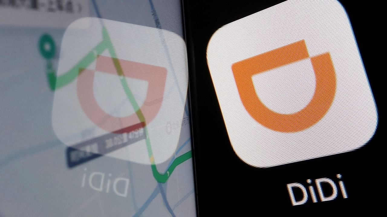 The app logo of Chinese ride-hailing giant Didi is seen reflected on its navigation map displayed on a mobile phone in this illustration picture taken July 1, 2021. Credit: Reuters File Photo