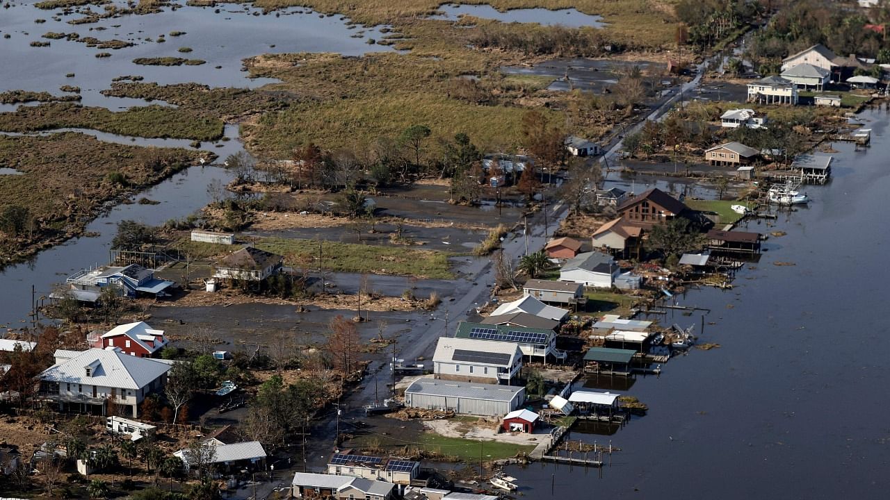 A view of flood damaged buildings are seen as US President Joe Biden (not pictured) inspects the damage from Hurricane Ida. Credit: AFP Photo