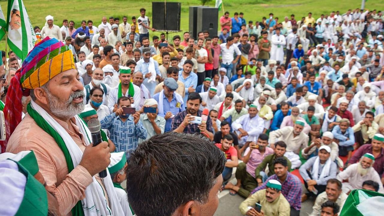 BKU spokesperson Rakesh Tikait speaks during a 'mahapanchayat' Credit: PTI Photo