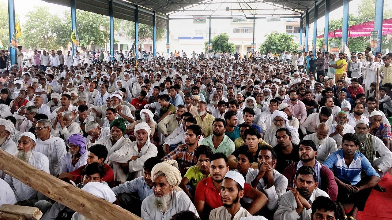 Farmers at Samyukt Kisan Morcha's Kisan Mahapanchayat at Haryana. Credit: PTI File Photo