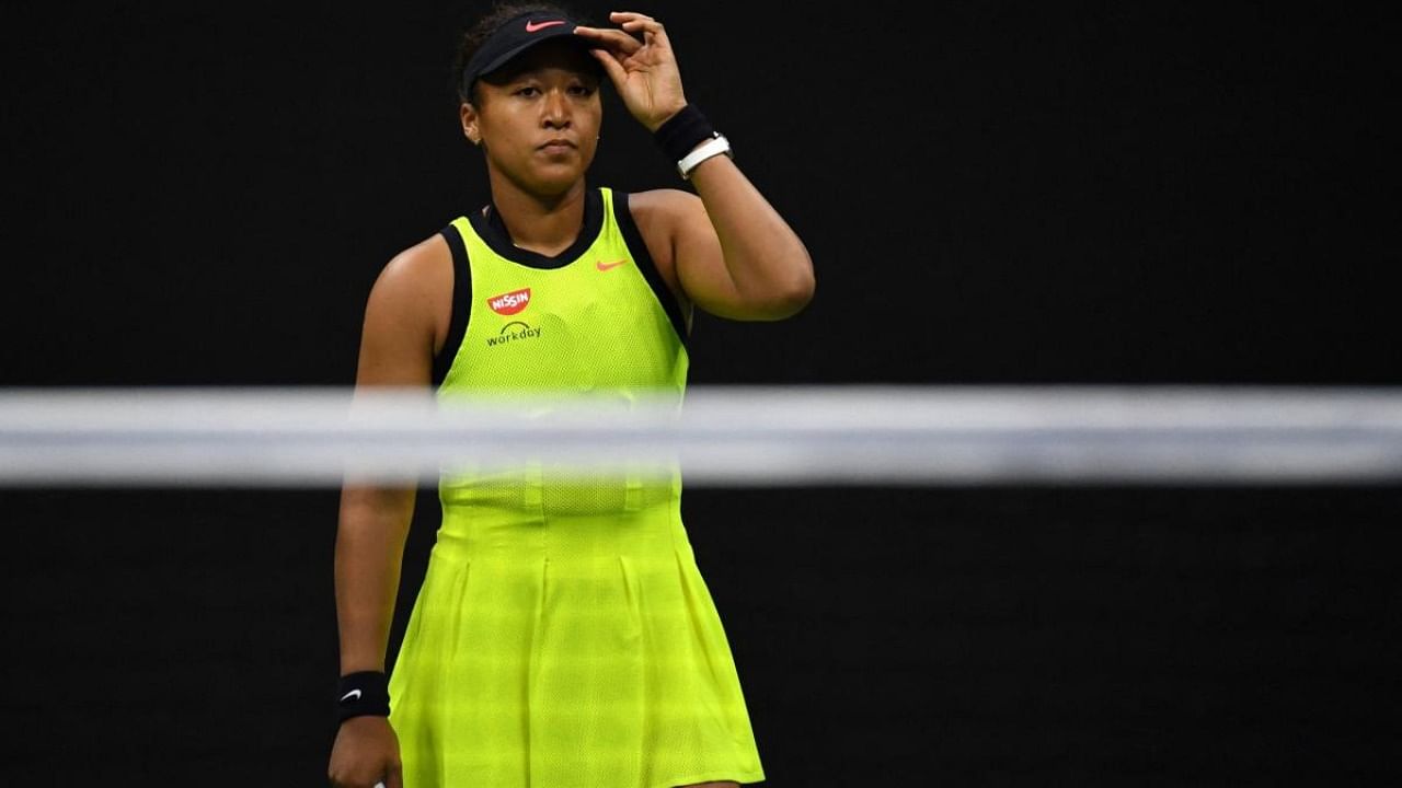 Japan's Naomi Osaka reacts during her 2021 US Open Tennis tournament women's singles third round match against Canada's Leylah Fernandez at the USTA Billie Jean King National Tennis Center in New York. Credit: AFP Photo