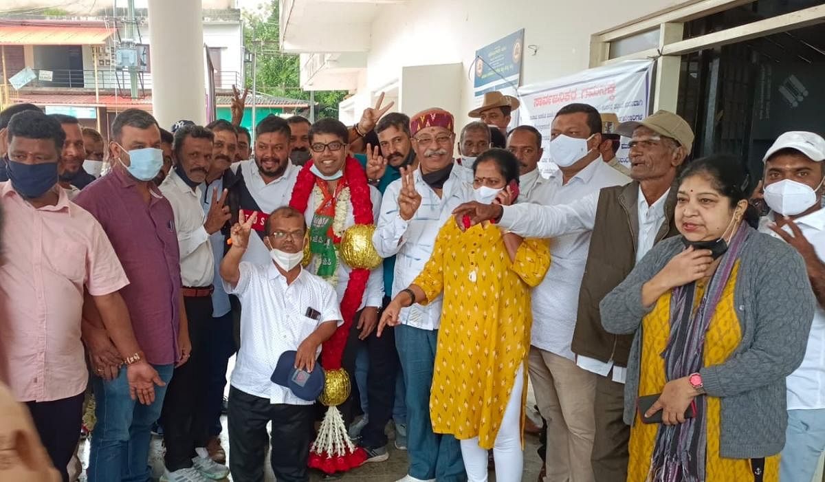 BJP members celebrate the victory of Vinank Kuttappa in the Virajpet Town Panchayat byelection.