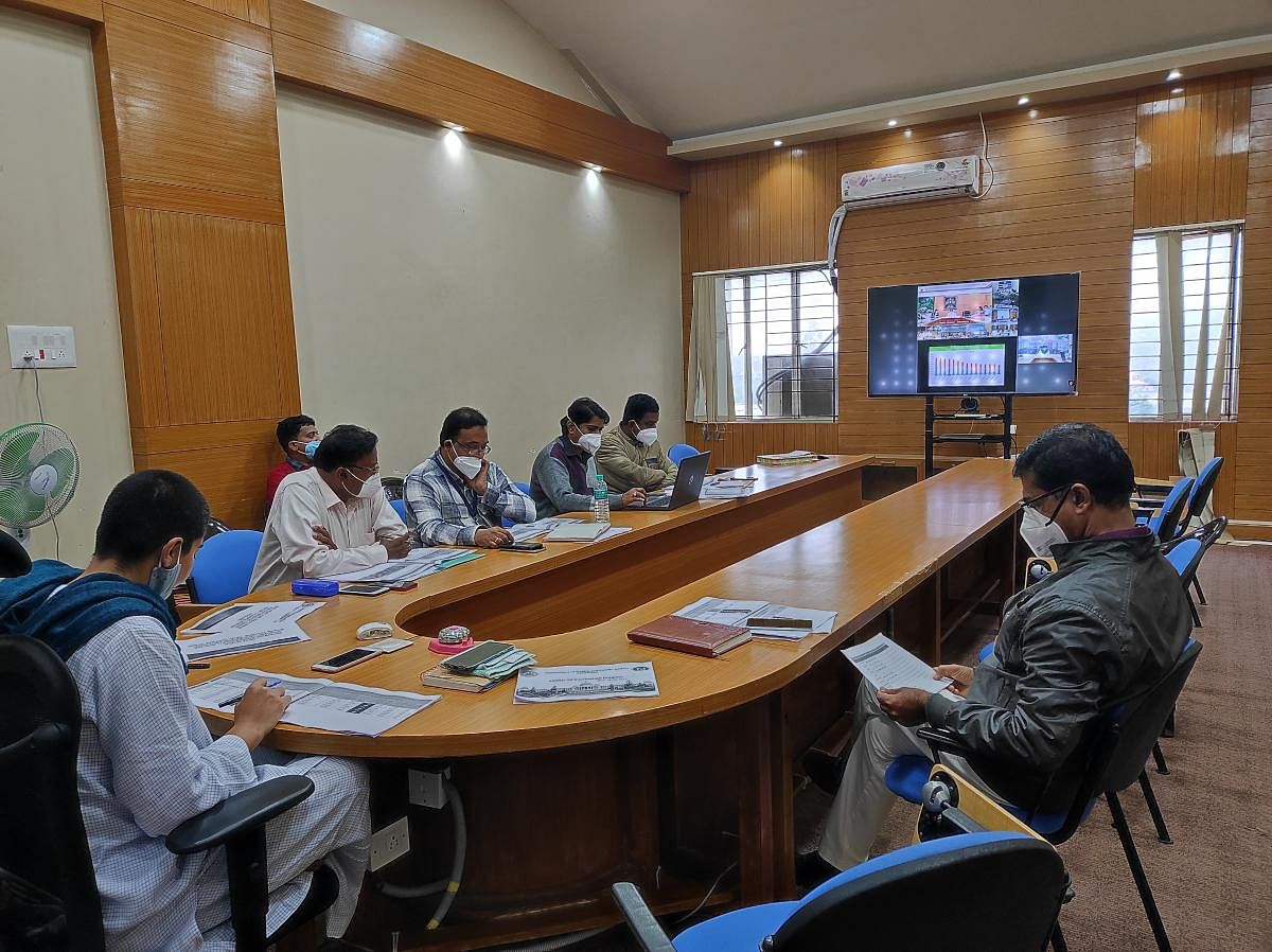 Deputy Commissioner Charulata Somal speaks during a video conference with minister Dr Sudhakar.