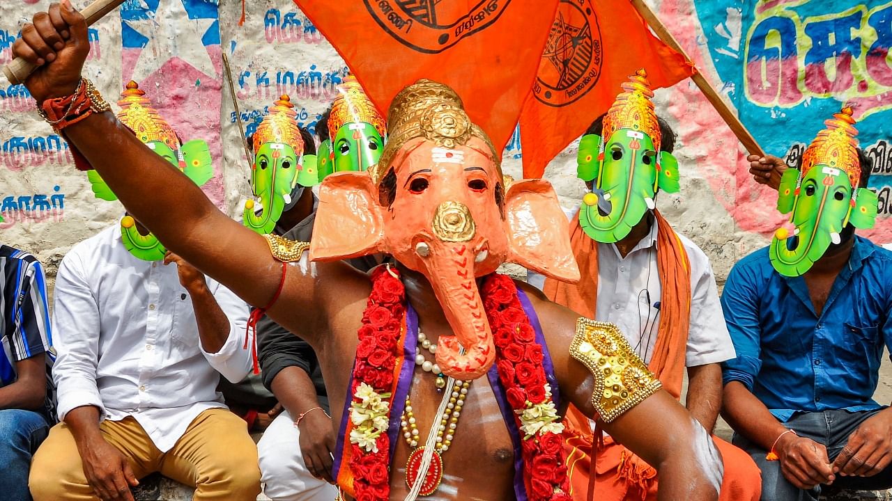Members of Hindu Munnani, stage a protest against the state government's decision to not permit public installation of Lord Ganesh idols and mass processions and immersions ahead of Ganesh Chaturthi due to the Covid-19 pandemic, in Chennai. Credit: PTI Photo