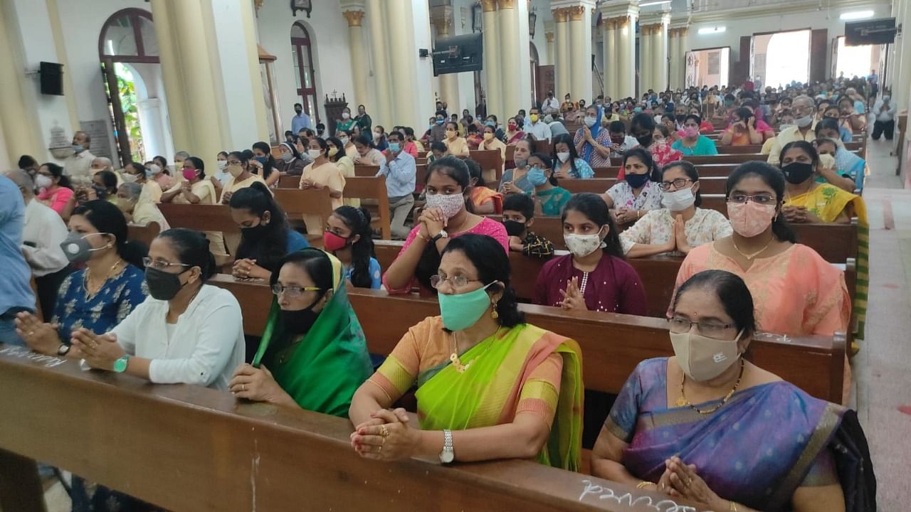 People from Catholic community attend a mass at Rosario Cathedral in Mangaluru on Wednesday. Credit: DH Photo/Irshad Mahammad