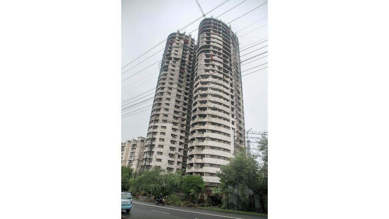 Real estate developer Supertech’s twin towers at plot number 4 in Section 93A at Noida, part of the National Capital Region. Credit: PTI Photo