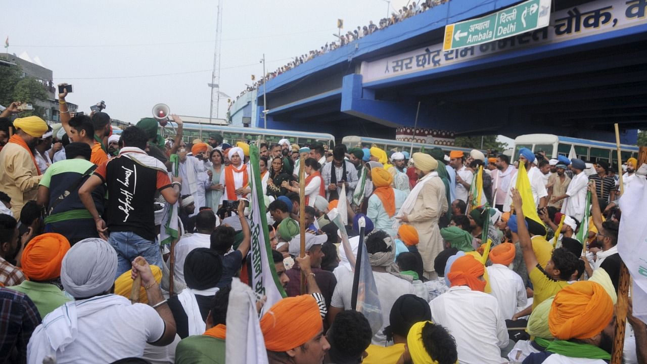 Farmers during their protest march against the central government's three farm reform laws, in Karnal. Credit: PTI Photo