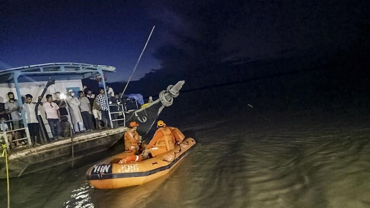 Rescue operations under way after two ferries collided in the Bhramaputra in Assam on Wednesday. Several people were missing after a ferry carrying more than 100 persons collided with another ferry and capsized in the Brahmaputra river in Assam's Jorhat district. Credit: PTI Photo