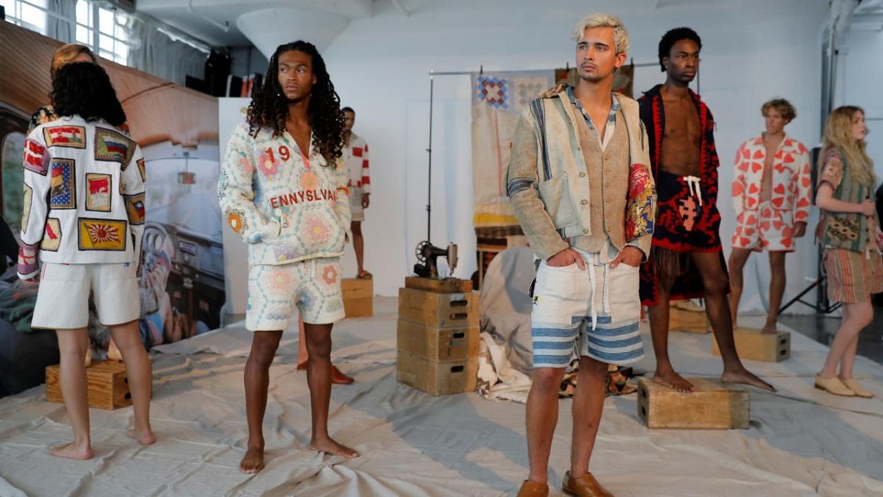 Models pose as they present creations from the STAN Spring/Summer 2022 collection at New York Men's Day during New York Fashion Week. Credit: Reuters Photo