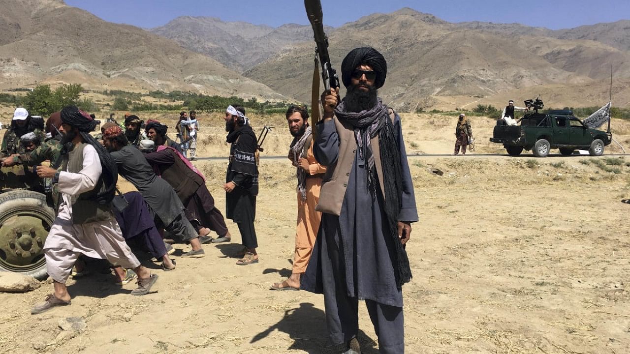 Taliban soldiers stand guard in Panjshir province northeastern of Afghanistan. Credit: AP Photo