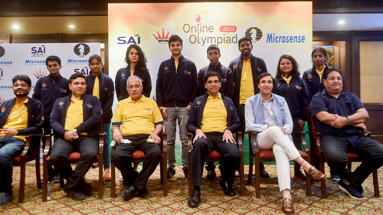 Viswanathan Anand with AICF officials and members of the Indian Online Olympiad squad. Credit: PTI Photo