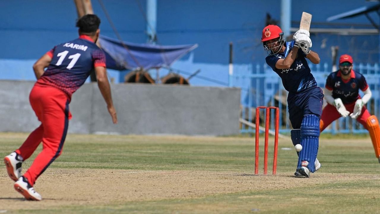 A Peace Defenders team player (R) plays a shot during the Twenty20 cricket trial match being played between the two Afghan teams 'Peace Defenders' and 'Peace Heroes' at the Kabul International Cricket Stadium in Kabul. Credit: AFP file photo