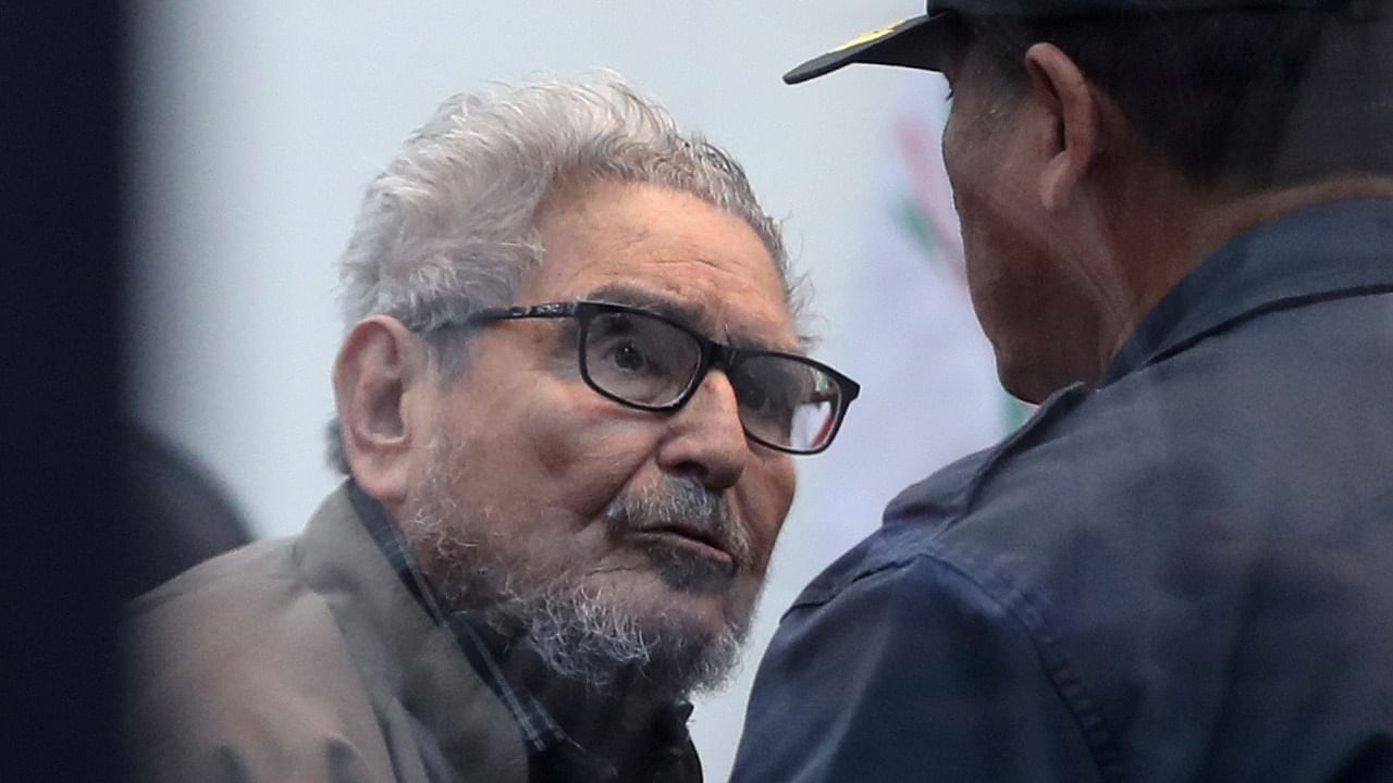 Shining Path founder Abimael Guzman attends a trial during sentence of a 1992 Shining Path car bomb case in Miraflores, at a high security naval prison in Callao. Credit: Reuters file photo