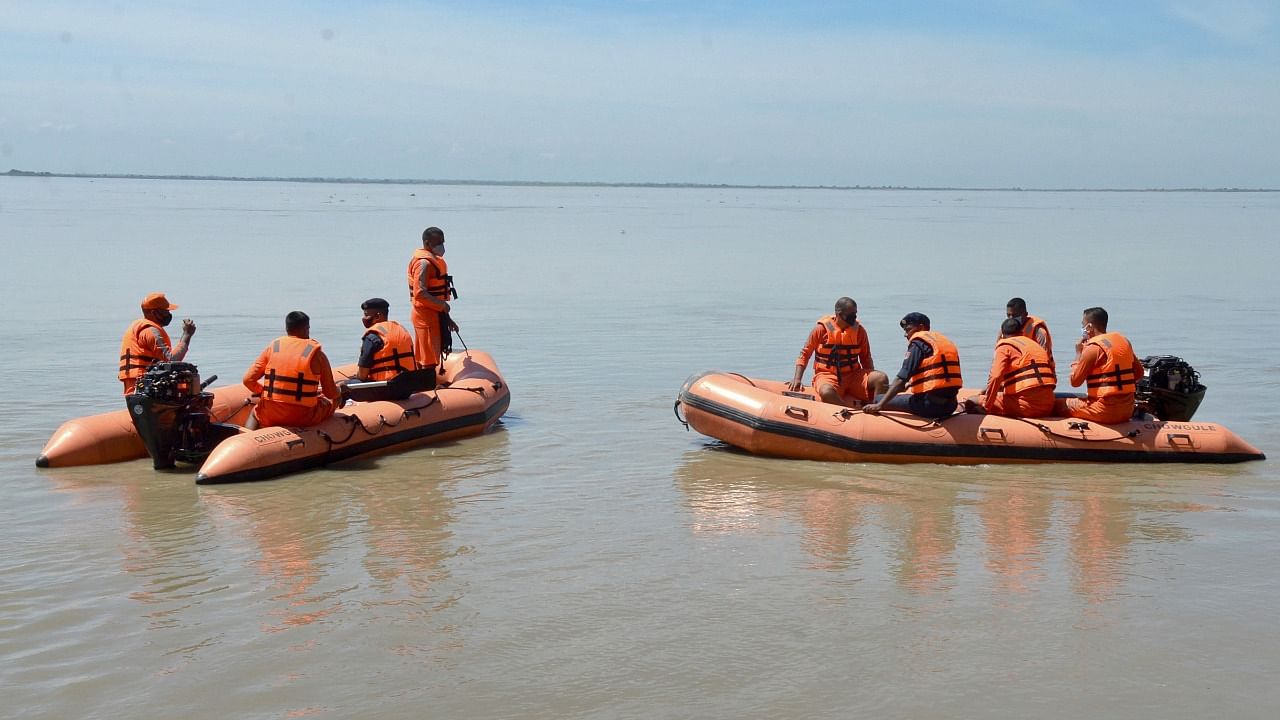NDRF search operation in Brahmaputra river. Credit: PTI Photo