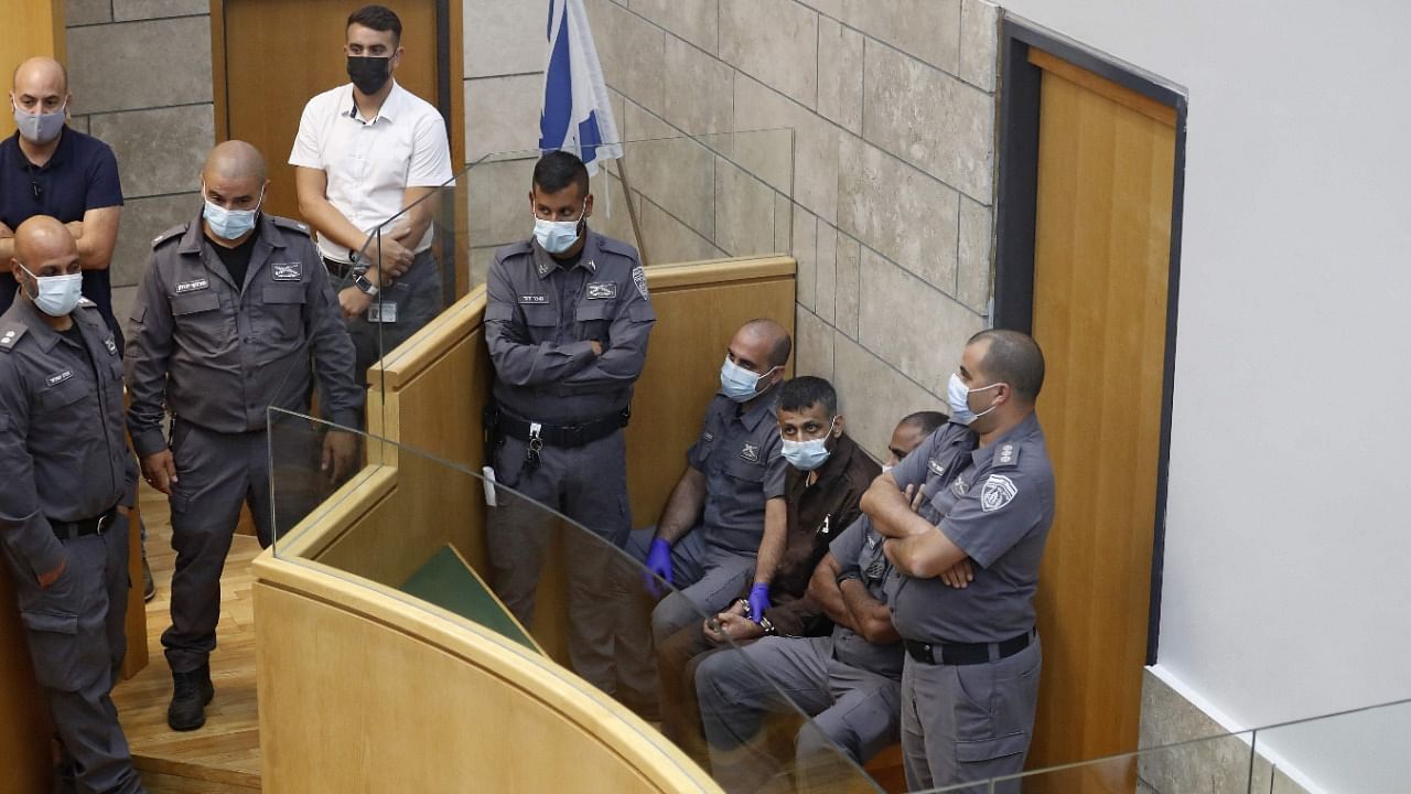 The latest two fugitives to be recaptured, who include a prominent former militant leader, were found hiding in a lorry park just outside Nazareth in northern Israel, police said. Credit: AFP Photo