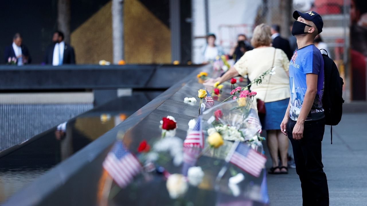 People visit the 9/11 Memorial on the 20th anniversary of the September 11 attacks in Manhattan, New York City. Credit: Reuters Photo