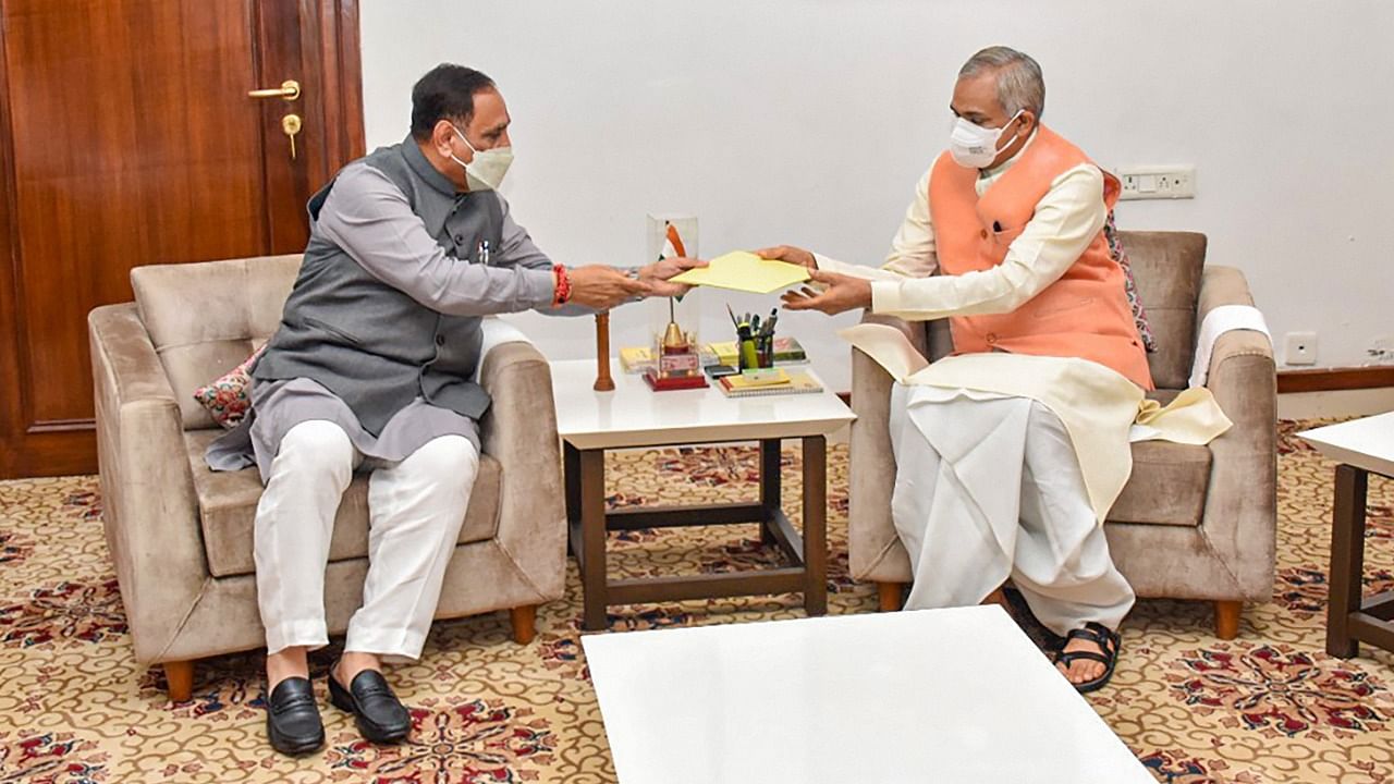 Gujarat Chief Minister Vijay Rupani submits his resignation letter to Governor Acharya Devvrat at Raj Bhavan in Gandhinagar, Saturday, September 11, 2021. Credit: PTI Photo