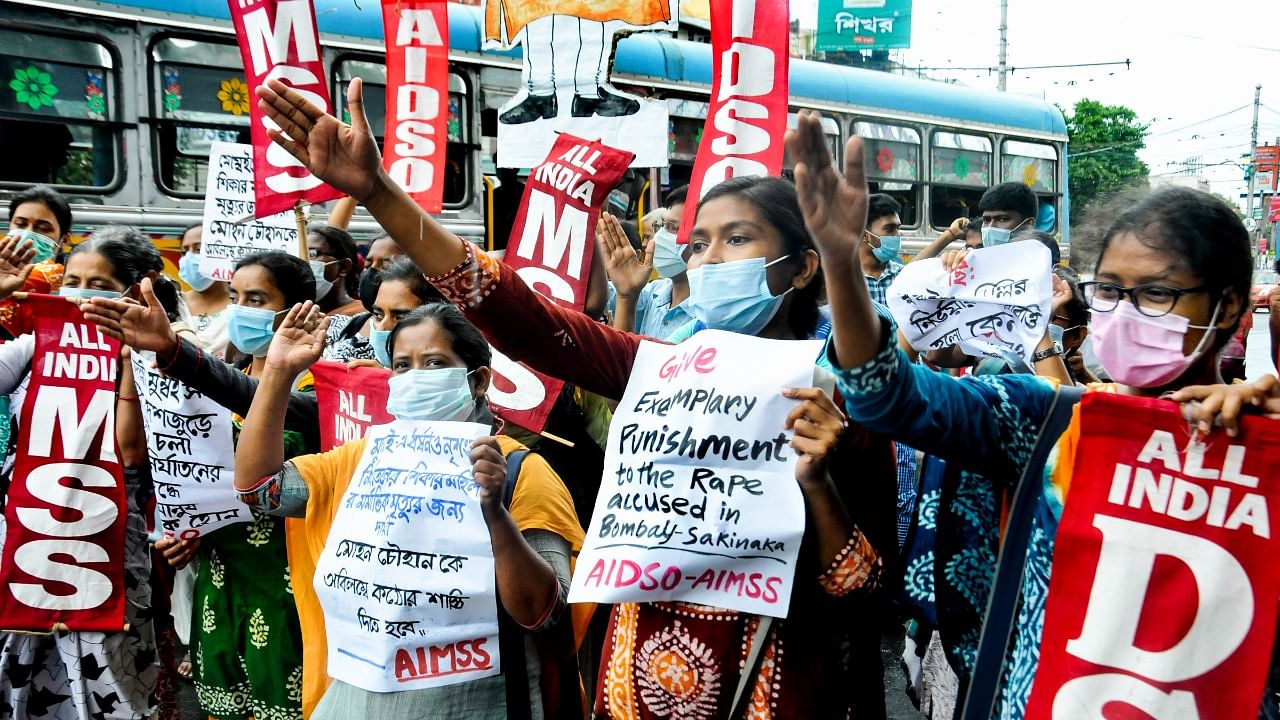 Members of AIDSO (All India Democratic Students' Organisation) and AIMSS (All India Mahila Sankritik Sangathan), participate in a protest rally after a 32-year-old woman was raped in Mumbai's Sakinaka area, in Kolkata, Sunday. Credit: PTI Photo
