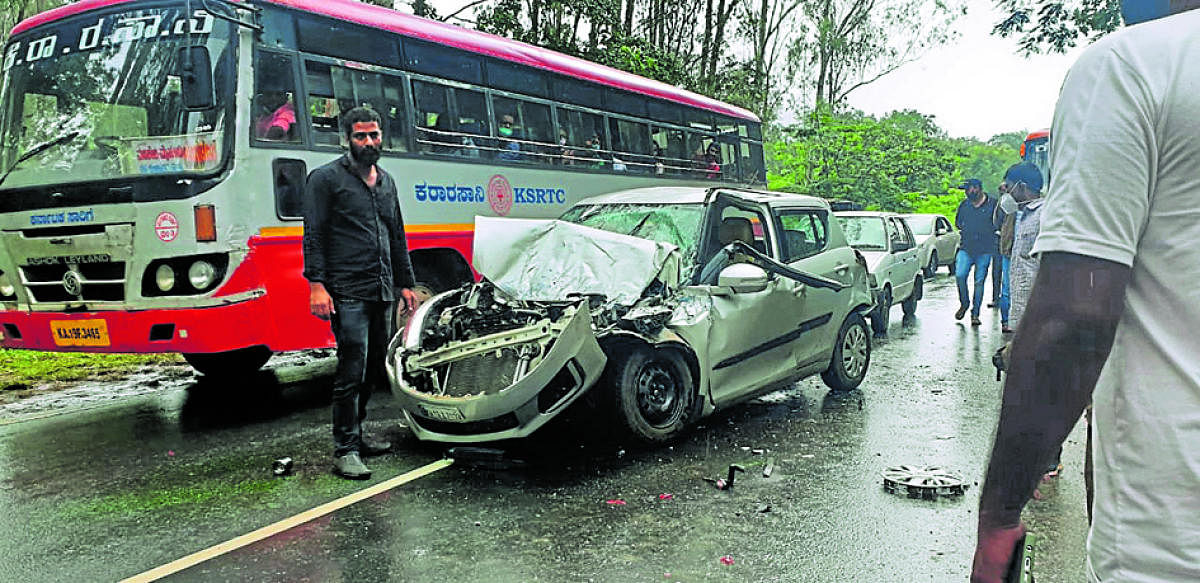 A car damaged in the accident on Anekadu National Highway.