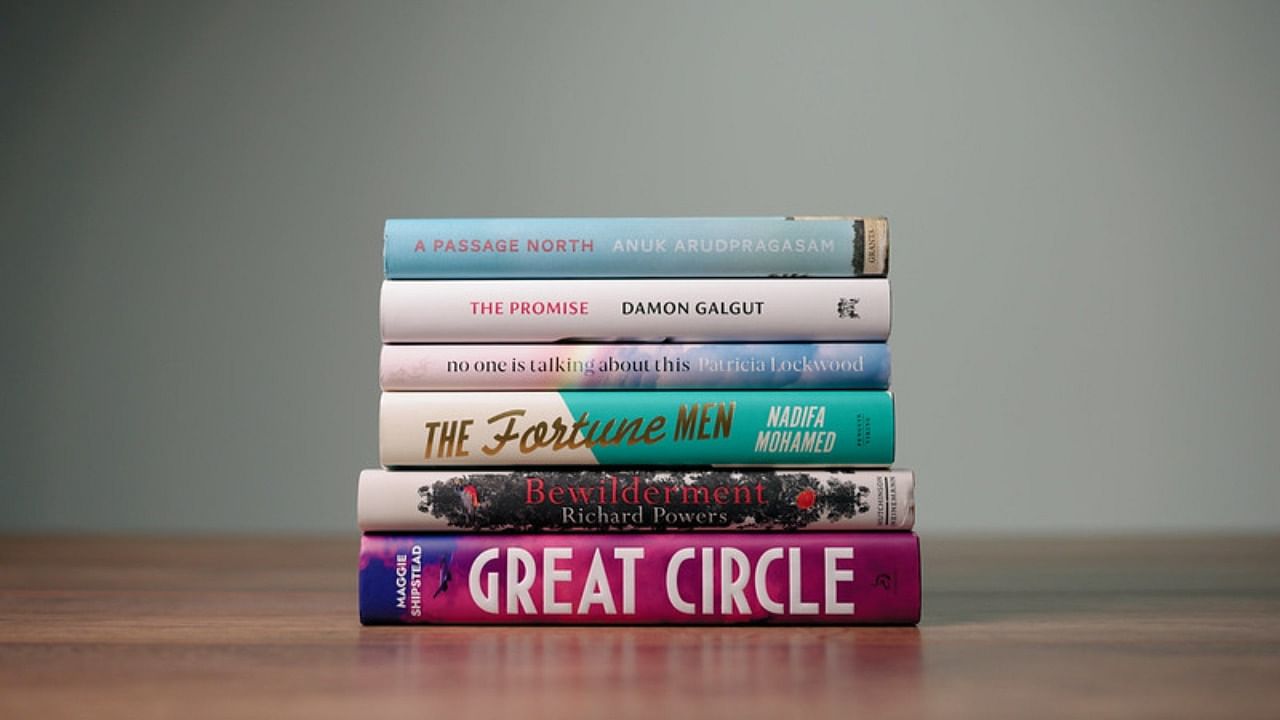 The six novels shortlisted from 158 works are by Sri Lankan author Anuk Arudpragasam, South African playwright and novelist Damon Galgut, British-Somali novelist Nadifa Mohamed and US writers Patricia Lockwood, Richard Powers and Maggie Shipstead. Credit: The Booker Prizes
