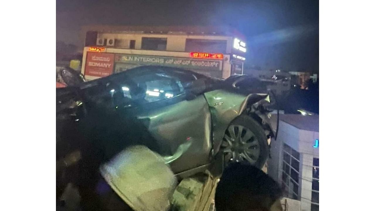 The car which hit the bike and crashed into the sidewall of the flyover on Hosur Road. 