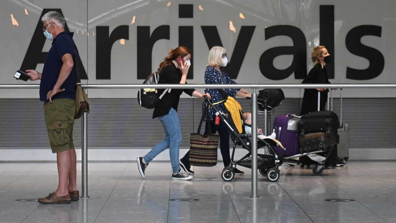The UK government Friday, September 17, relaxed pandemic restrictions on travel into England, overhauling its "traffic light" watchlist with a simpler regime for fully vaccinated arrivals. Credit: AFP File Photo