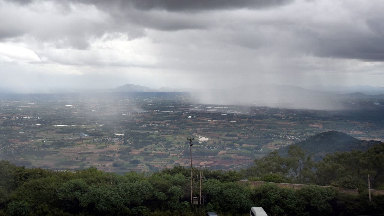 Rain shower seen from Nandi Hills. Credit: DH File Photo