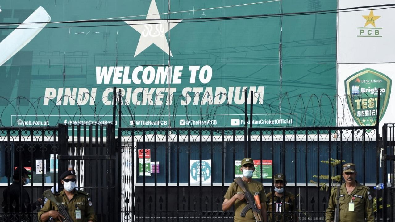 Police officers stand guard outside Rawalpindi Cricket Stadium after New Zealand cricket team pull out of a Pakistan cricket tour over security concerns, in Rawalpindi, Pakistan. Credit: Reuters Photo 