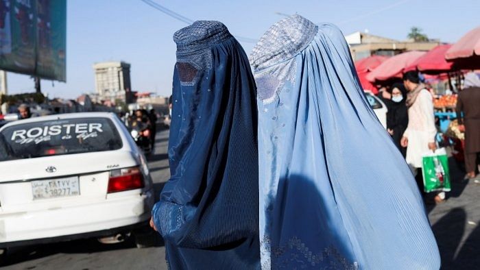 Afghan women walk down a street in Kabul, Afghanistan, September 16, 2021. Picture taken on September 16, 2021. Credit: WANA (West Asia News Agency) via Reuters