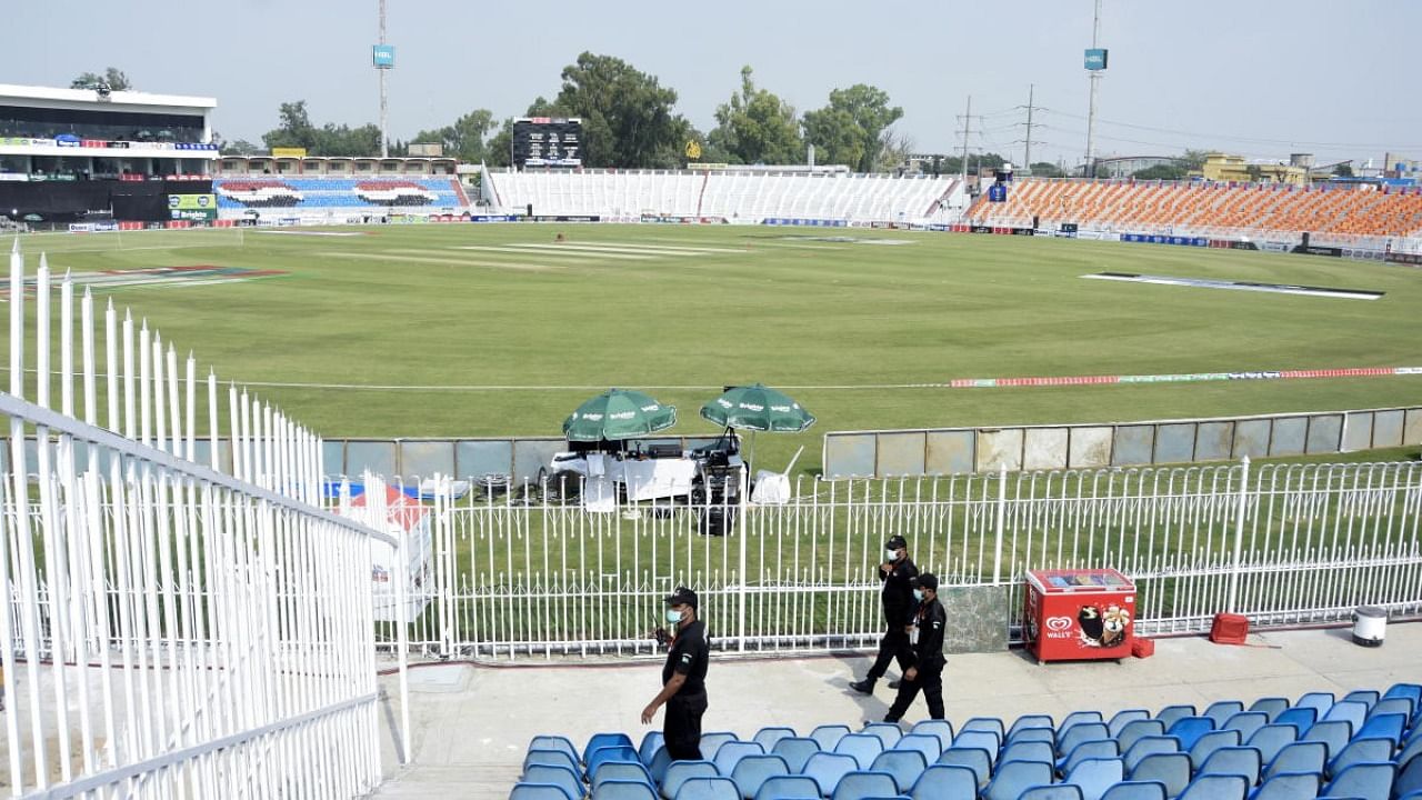 Members of the Police Elite Force walk in an enclosure at the Rawalpindi Cricket Stadium after the New Zealand cricket team pulled out of a Pakistan cricket tour over security concerns, in Rawalpindi, Pakistan. Credit: Reuters Photo