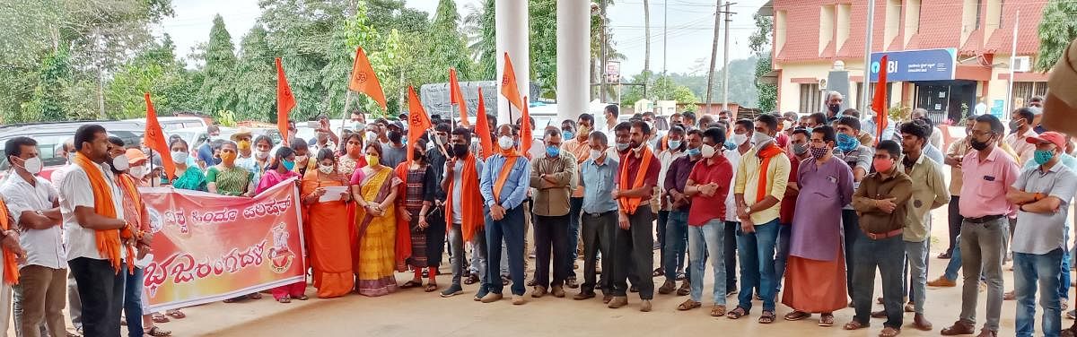VHP and Bajrang Dal workers staged a protest in Virajpet against the demolition of temples.