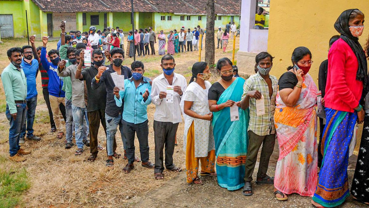 Beneficiaries wait to receive a dose of Covid-19 vaccine in Chikmagalur. Credit: PTI Photo