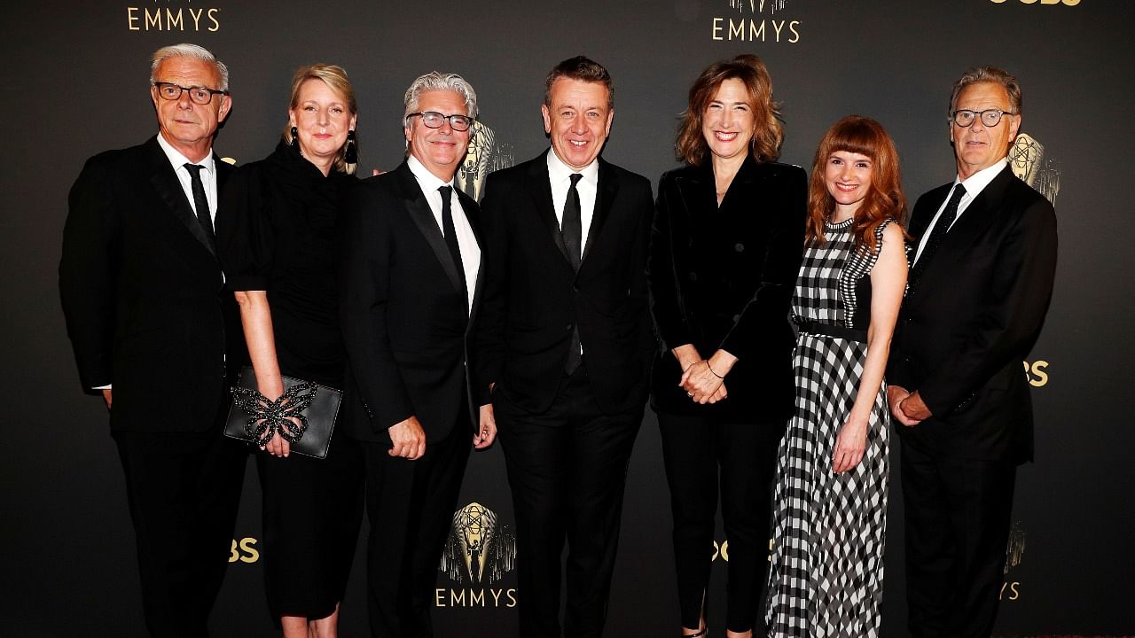 Showrunner Peter Morgan, Director Jessica Hobbs, Executive Producers Stephen Daldry, Robert Fox, Matthew Byam Shaw and Suzanne Mackie, and Producer Oona O'Beirn, pose at the Netflix UK Primetime Emmy Red Carpet for "The Crown" in London, Britain, September 19, 2021. Credit: Reuters Photo