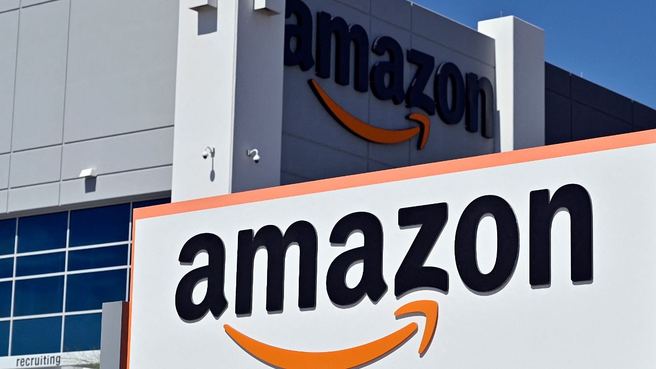 Amazon India has been innovating to expand the digital opportunity to both customers and businesses by localising various offerings. Credit: AFP Photo