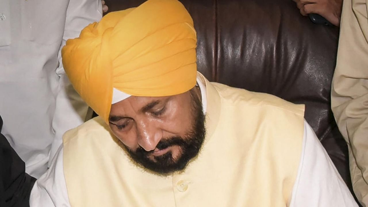 New Punjab Chief Minister Charanjit Singh Channi takes charge of the office, in Chandigarh, Monday, Sept. 20, 2021. 