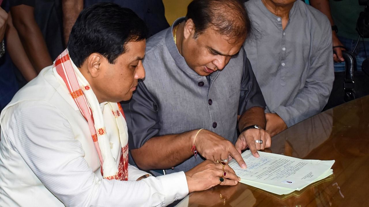 Union Minister Sarbananda Sonowal files his nomination papers for the Rajya Sabha elections in the presence of Assam Chief Minister Himanta Biswa Sarma (R). Credit: PTI Photo
