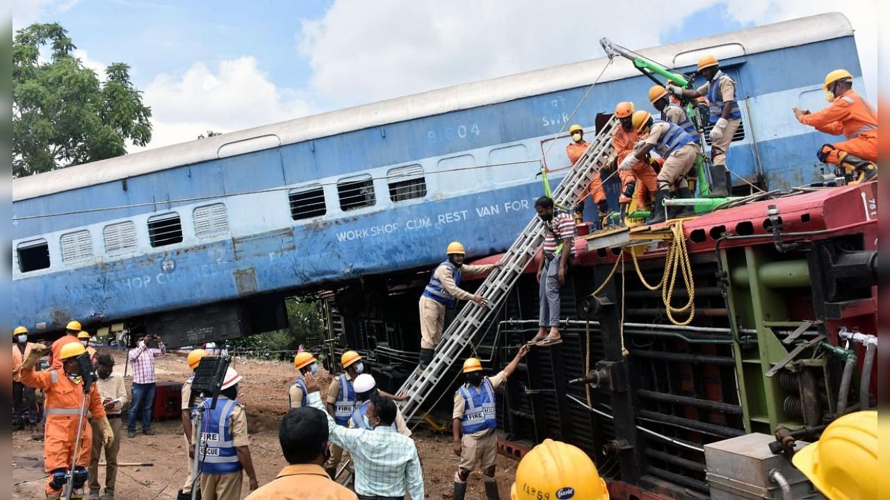 Personnel of Mysuru division of South Western Railway, National Disaster Response Force and State government departments conducted a mock drill of a train derailment-induced rescue and relief operation at Ashokapuram Railway Station in Mysuru on Tuesday. Credit: DH photo