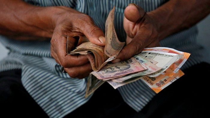 On Tuesday, the rupee had settled at 73.61 against the US dollar. Credit: Reuters File Photo