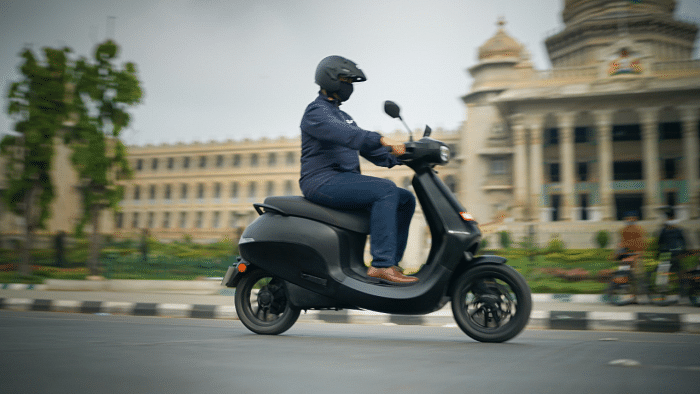 Bhavish Aggarwal on the Ola S1 scooter. Credit: DH Photo