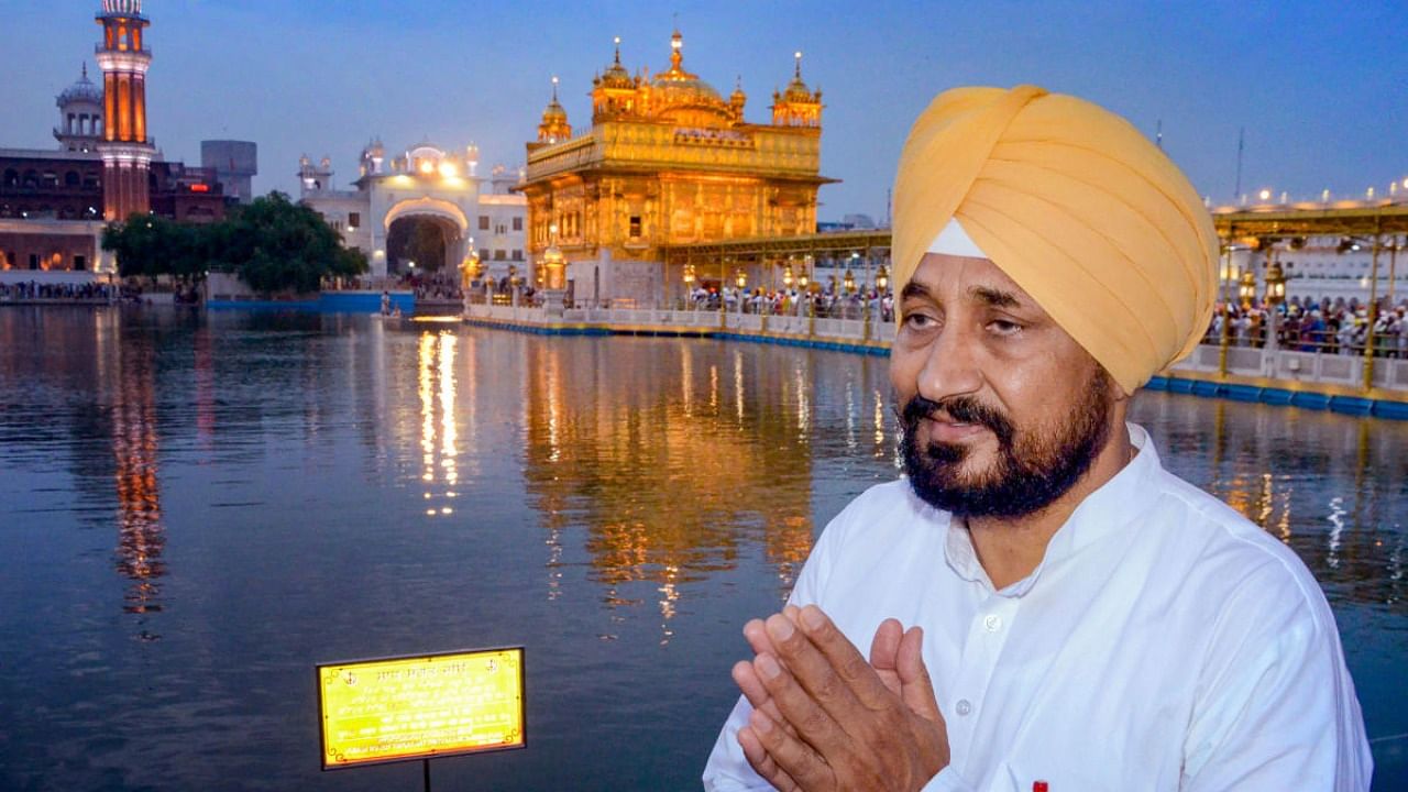 Punjab Chief Minister Charanjit Singh Channi offers prayers at Golden Temple in Amritsar. Credit: PTI Photo