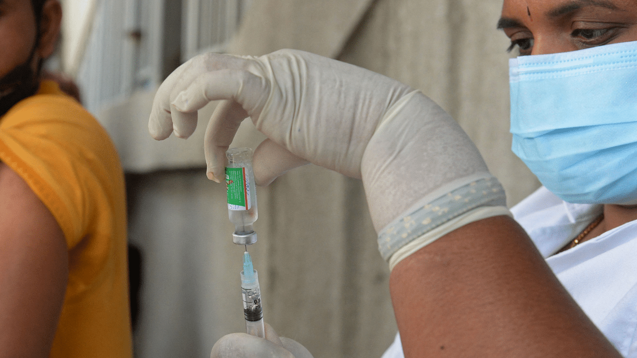 The UK is engaging with the government of India to explore how it could expand its recognition of vaccine certification to Covishield, officials said. Credit: AFP Photo