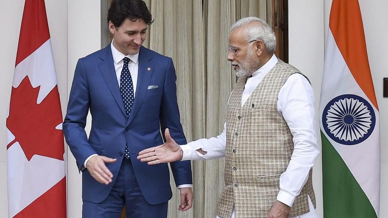 Prime Minister Narendra Modi with his Canadian counterpart Justin Trudeau at G-7 summit in Biarritz, France. Credit: PTI File Photo